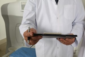 Doctor with tablet
