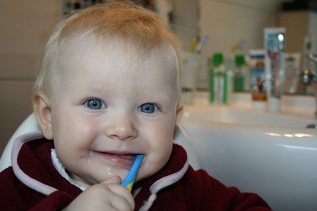 Baby Brushing Teeth - Dental Insurance tooth decay