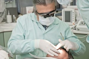 Dentist Performing Procedure